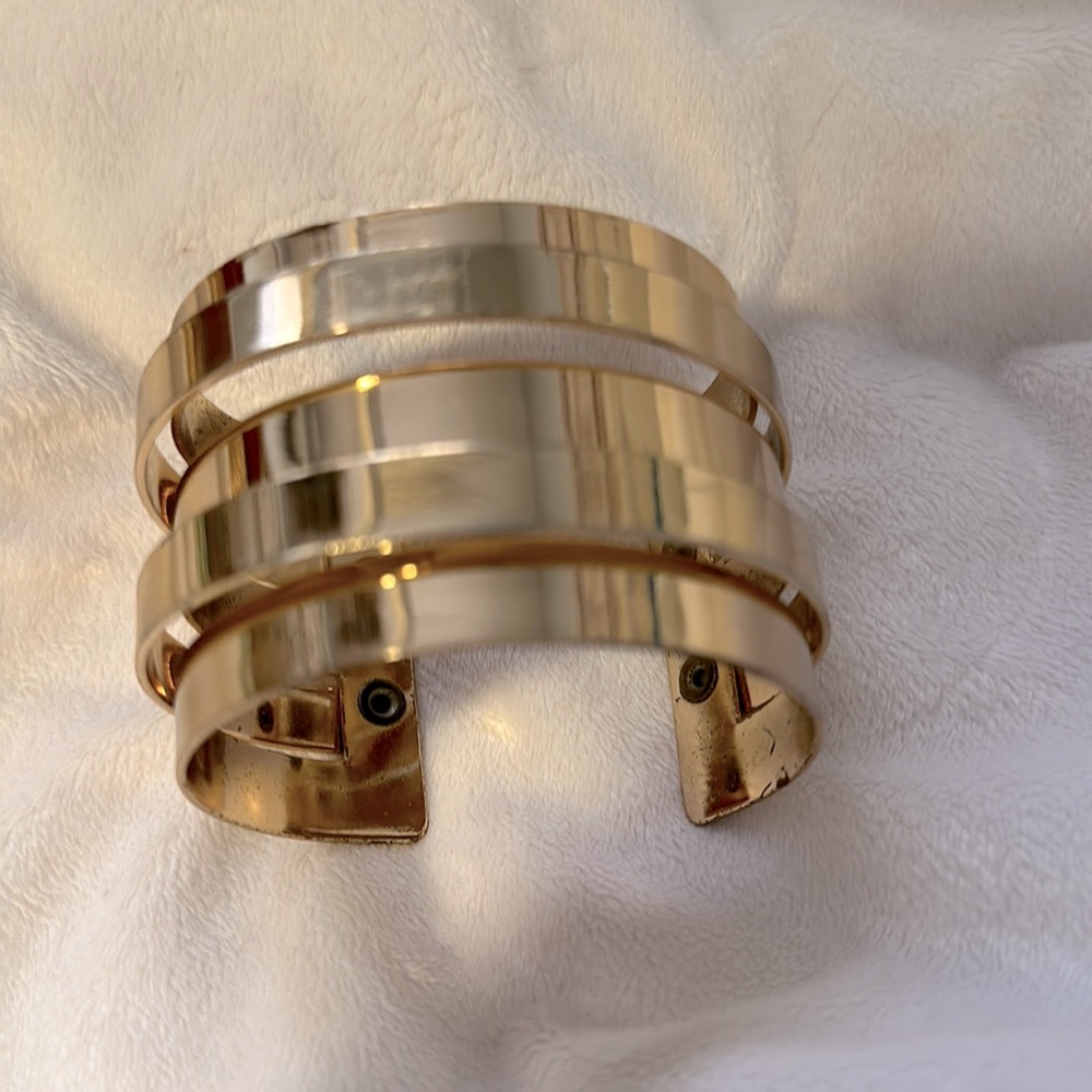 Adjustable gold cuff bracelet from Charming Charlie’s